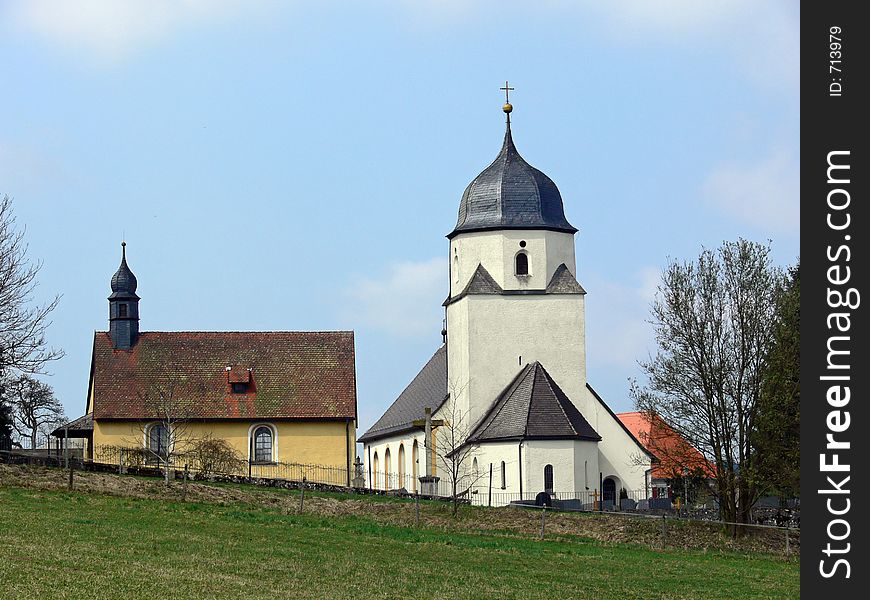 Church and chapel in a German village at springtime. Church and chapel in a German village at springtime