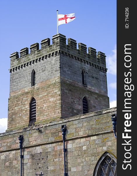 Old church from in Banburgh in Northumbria. Flying the English flag on Easter Sunday, 2006. Old church from in Banburgh in Northumbria. Flying the English flag on Easter Sunday, 2006.