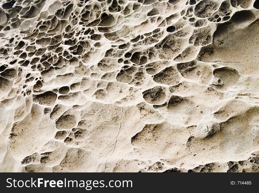 This rock has been weathered by the Pacific Ocean creating a sponge effect. This rock has been weathered by the Pacific Ocean creating a sponge effect.