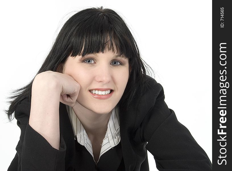 Young brunette business woman smiling.