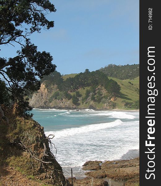 Surf rolling in on a Northland Beach,New Zealand. Surf rolling in on a Northland Beach,New Zealand