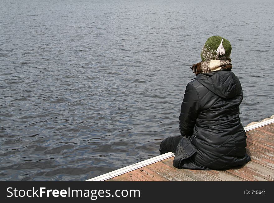 Pensive Woman by the lake. Pensive Woman by the lake