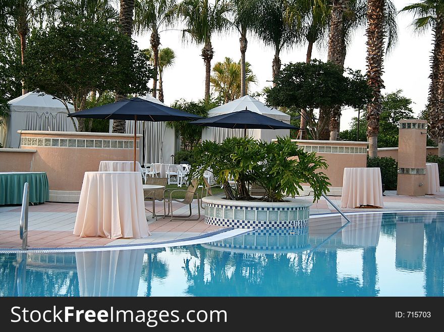 Pool Scenic with tables set for an event or formal occassion. Pool Scenic with tables set for an event or formal occassion