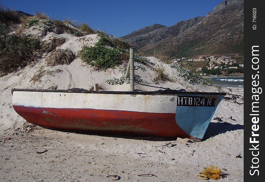 Abandoned fishing boat on beach. Abandoned fishing boat on beach