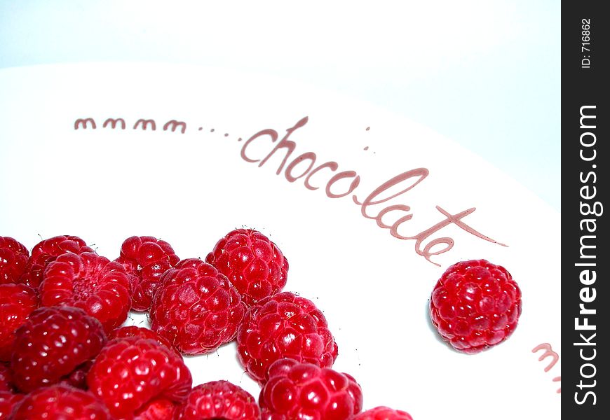Raspberries On A Plate