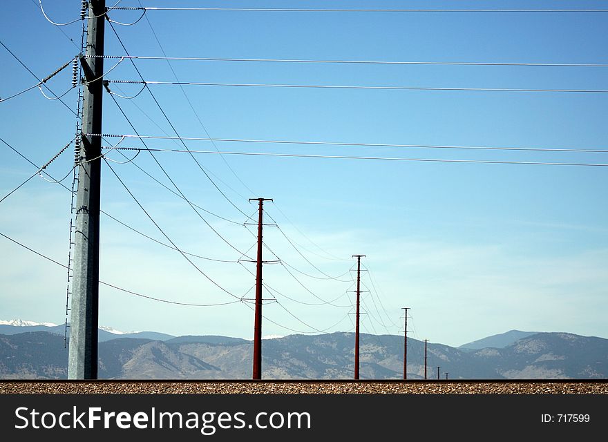 Powerlines with mountains in the background. Powerlines with mountains in the background