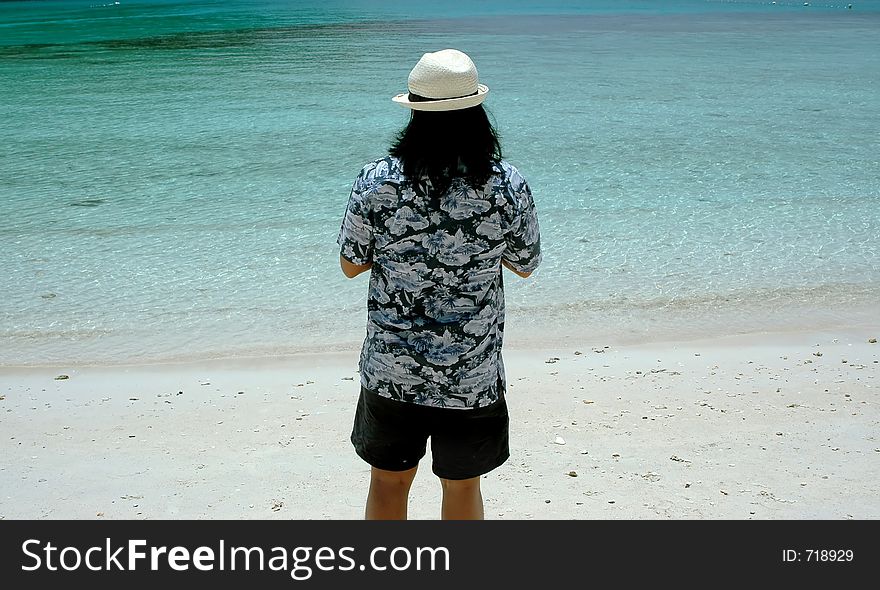 Man looking at the beach side