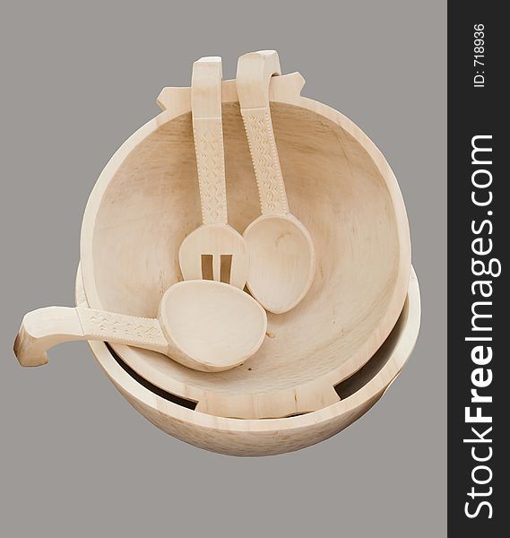 Wodden spoon, fork and bowl carved, isolated and with clipping path. Wodden spoon, fork and bowl carved, isolated and with clipping path