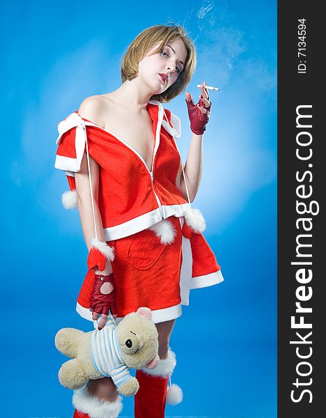 Smoking mrs. Santa with teddy bear