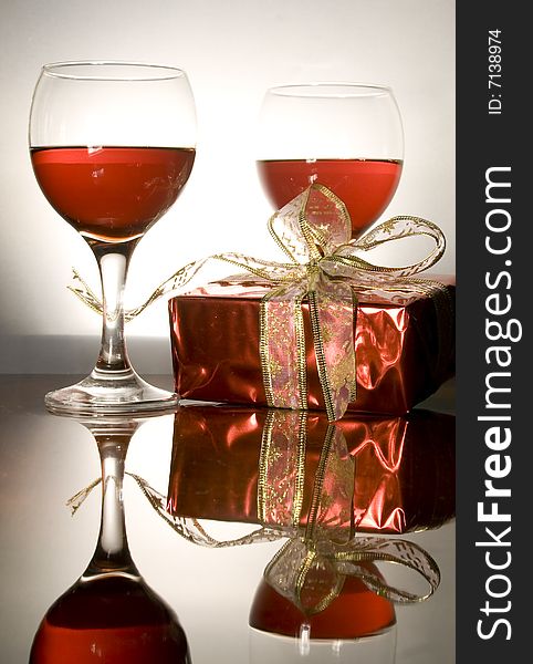 Christmas gifts decorations on reflecting background. Christmas gifts decorations on reflecting background