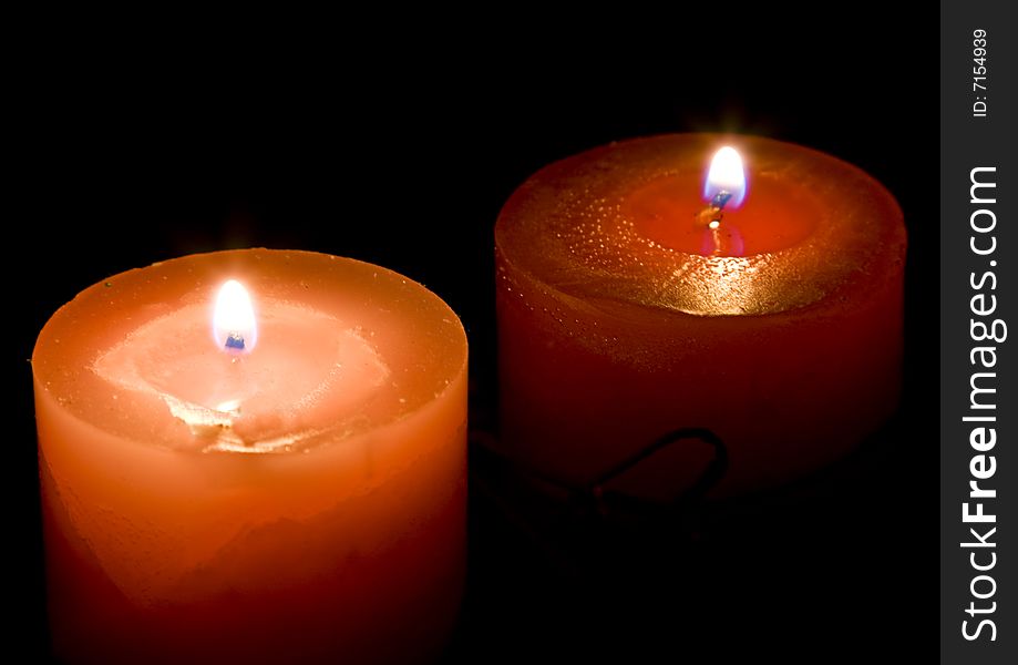 Red candles on dark background