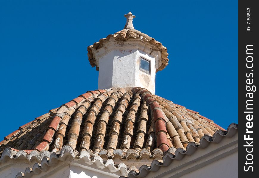 Old tiled Rooftop and tower. Old tiled Rooftop and tower
