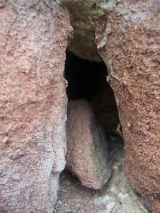 Stone In Sandstone Crevice Royalty Free Stock Photo Stone In Sandstone Crevice Royalty Free Stock Photo