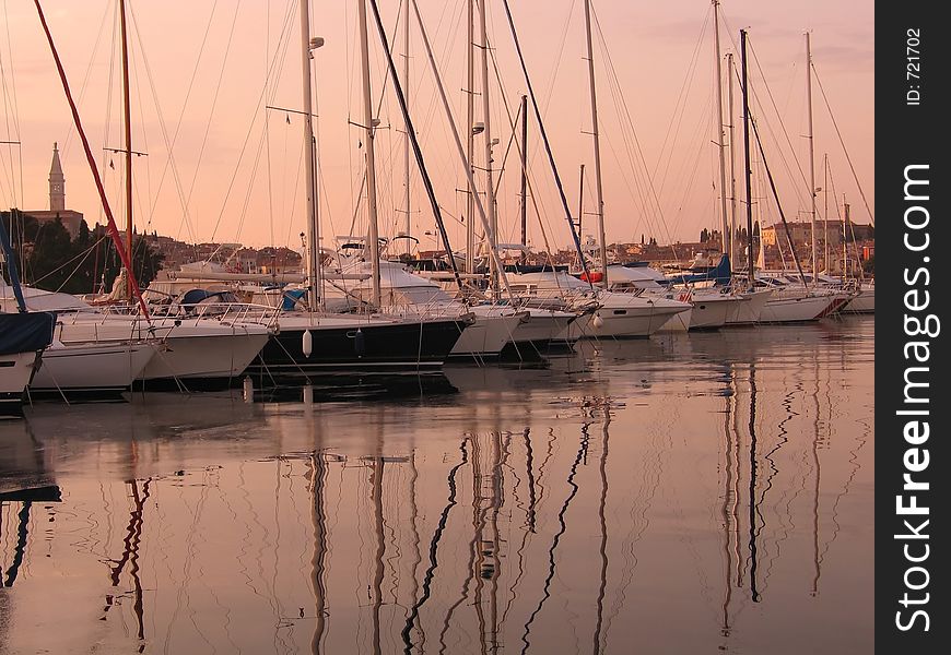 Luxury yachts at sunset