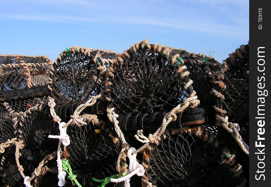 A close up of a cfew lobster / crab creel pots waiting to be taken to sea and laid out. A close up of a cfew lobster / crab creel pots waiting to be taken to sea and laid out.