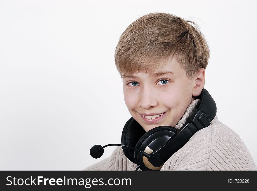 Cheerful boy in headphones. Cheerful boy in headphones