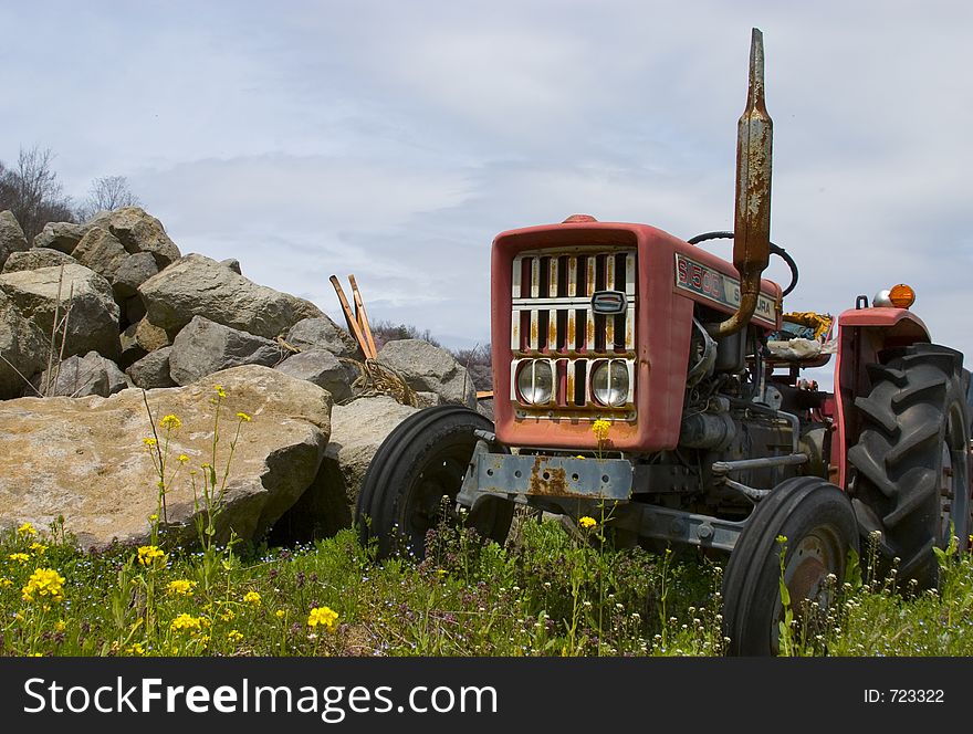 An decaying tractor in the Japanese countryside. An decaying tractor in the Japanese countryside.