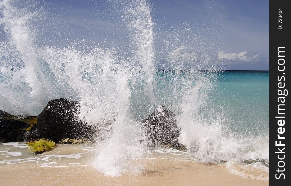 Splashing water on a beautiful caribbean beach. Splashing water on a beautiful caribbean beach