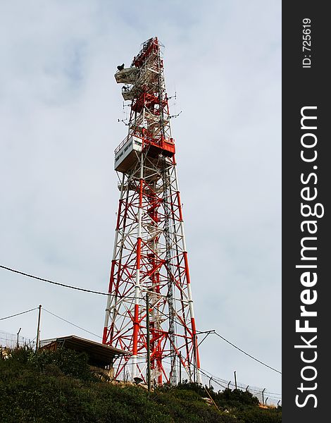 Telecommunications tower in a mountainous area. Telecommunications tower in a mountainous area