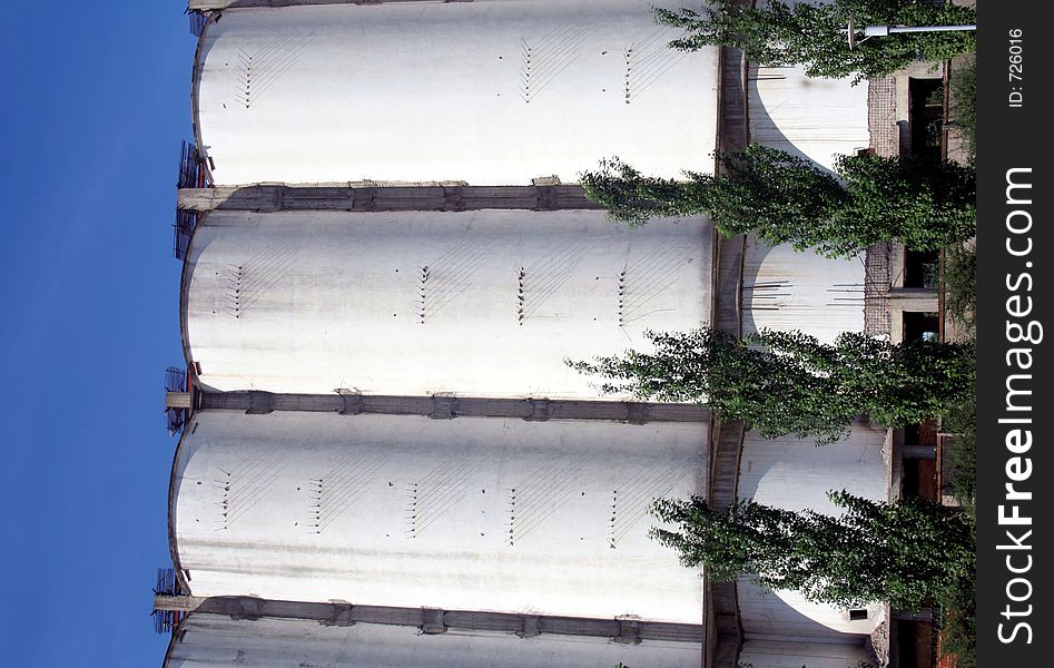 Three industrial storage tanks