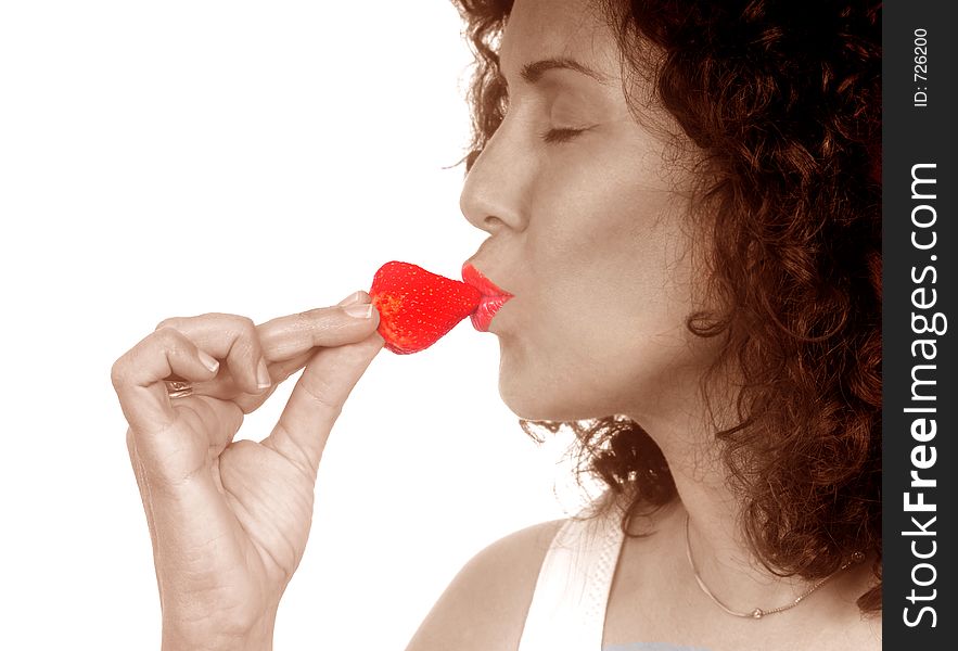 Woman Eating Strawberry. Woman Eating Strawberry