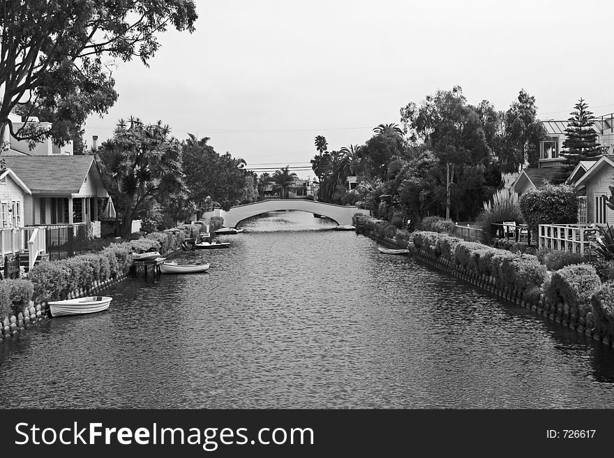 Canel in Venice, California with walkway bridge. Canel in Venice, California with walkway bridge