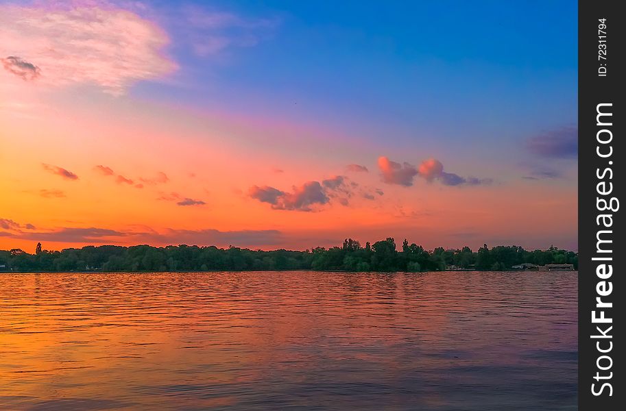 Vibrant Colorful Sunset On The Lake From Bucharest
