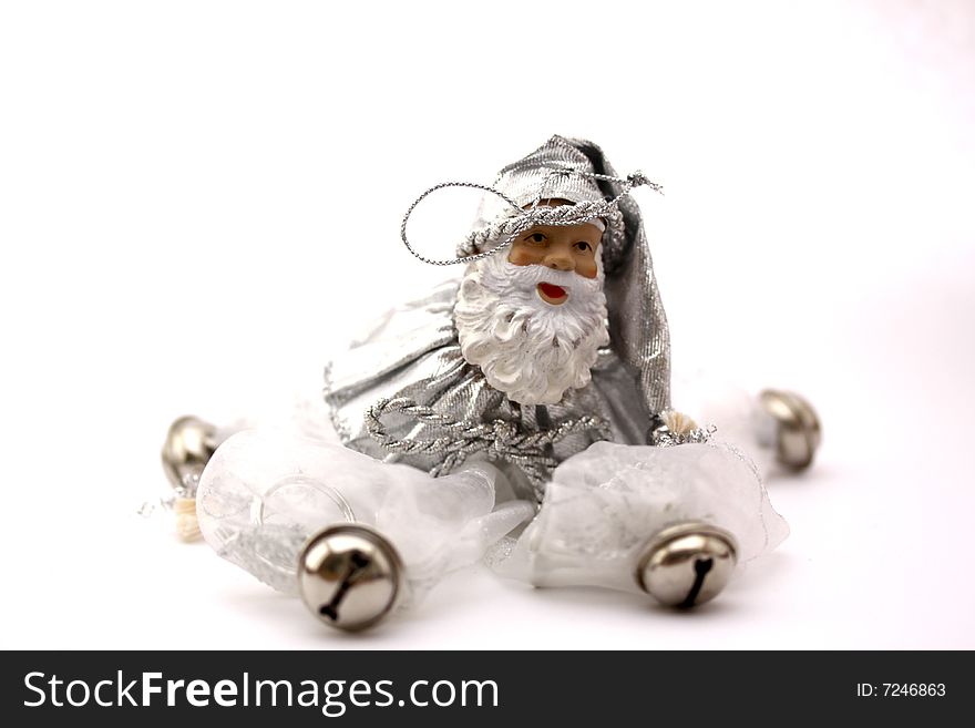 A decorative santa claus with bells on a white background. A decorative santa claus with bells on a white background