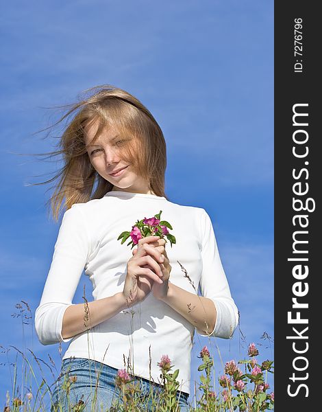 Young Woman Holding Flower