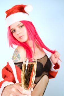 Attractive Mrs. Santa With Champagne Glass Stock Photos Attractive Mrs. Santa With Champagne Glass Stock Photos