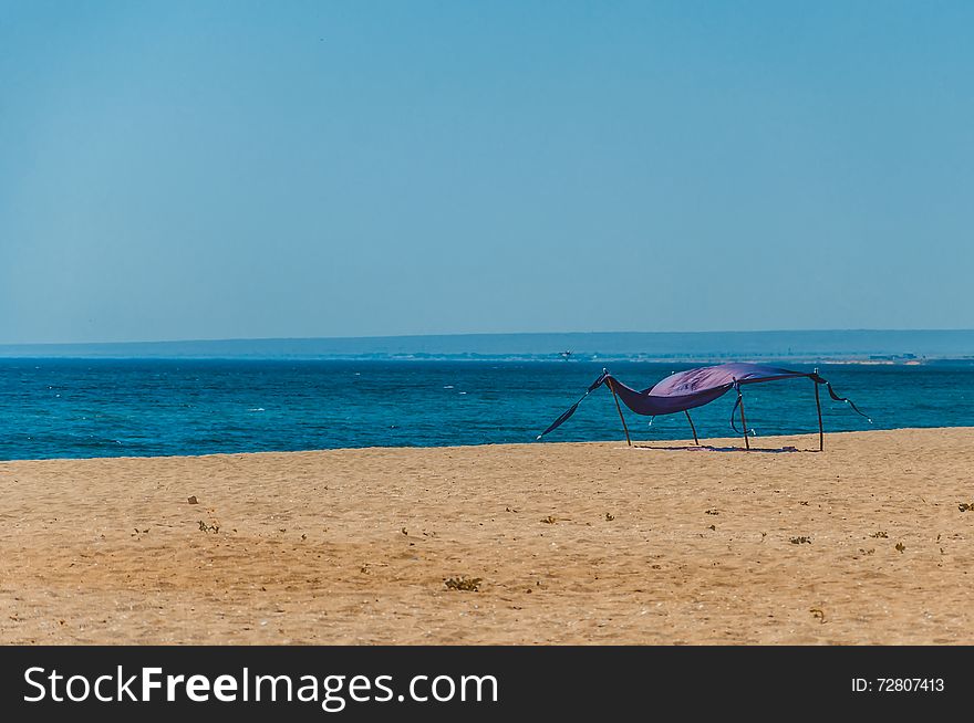 Lonely tent on empty beach
