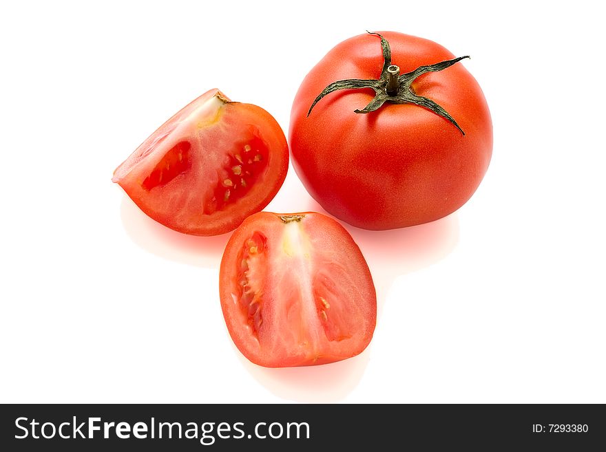 Red tomatoes isolated on white background. Studio light.