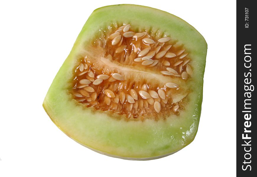 Half of a melon over white background with natural light reflection.