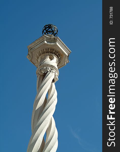 Beautiful medieval column in blue sky