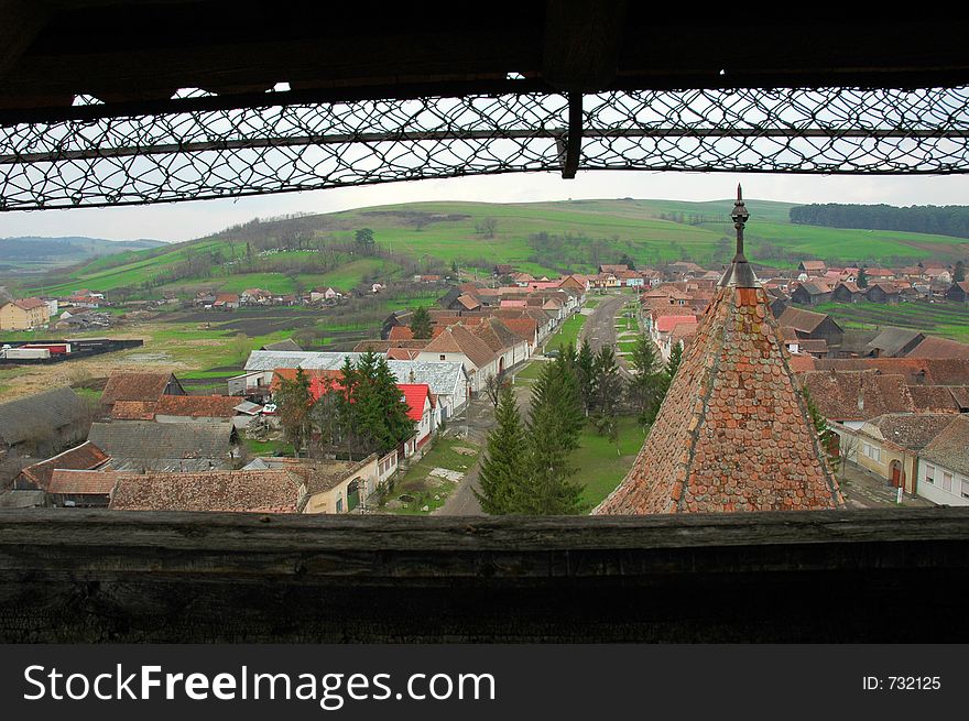 Panorama of Homorod village, taken from an old medieval tower. Fortified churces and peasant citadels are famous within these area of Romania. Built in the middle ages by German colonists. Unmanipulated shot. Panorama of Homorod village, taken from an old medieval tower. Fortified churces and peasant citadels are famous within these area of Romania. Built in the middle ages by German colonists. Unmanipulated shot.