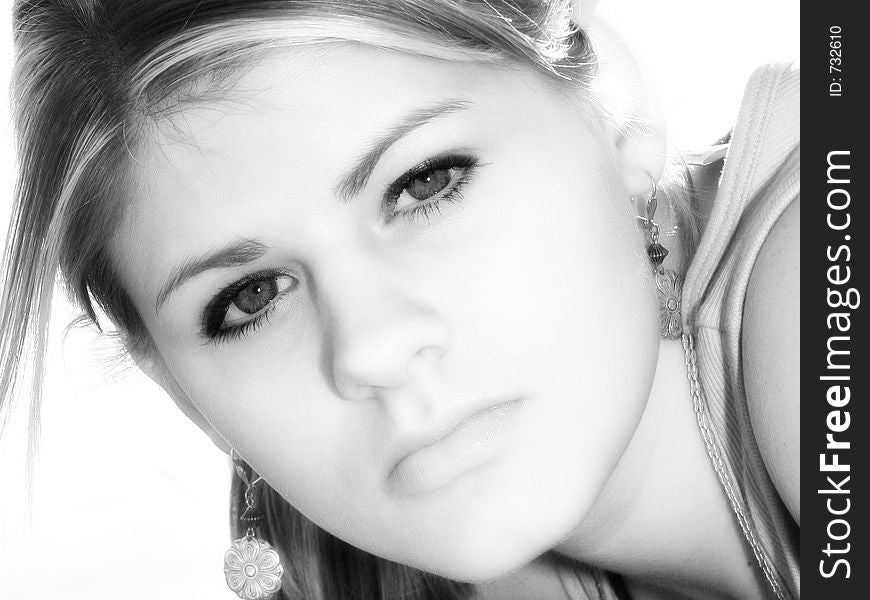 Beautiful teen girl outside close up in black and white. Beautiful teen girl outside close up in black and white.