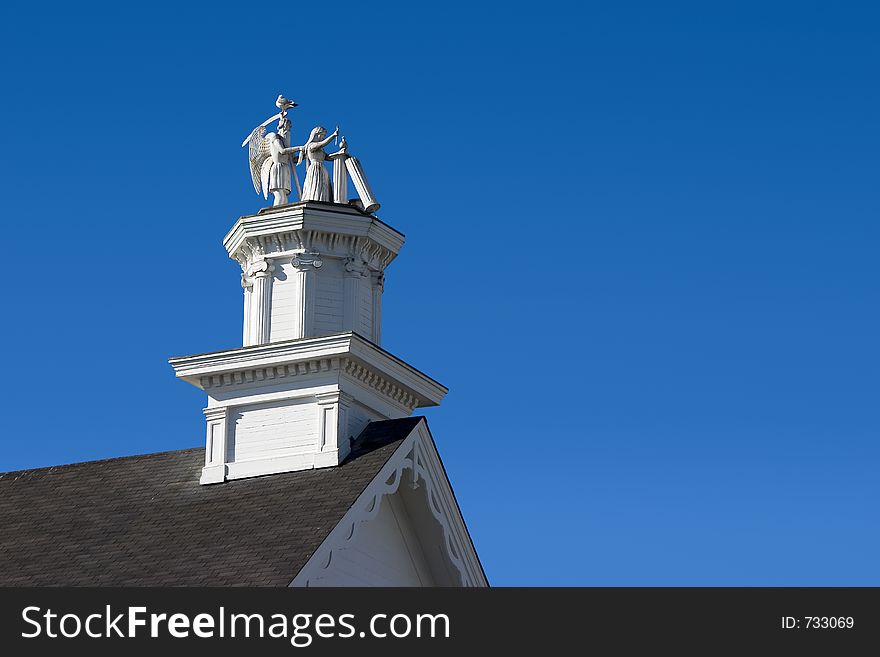 A statue depicting death on an old building in Mendocino California. A statue depicting death on an old building in Mendocino California.