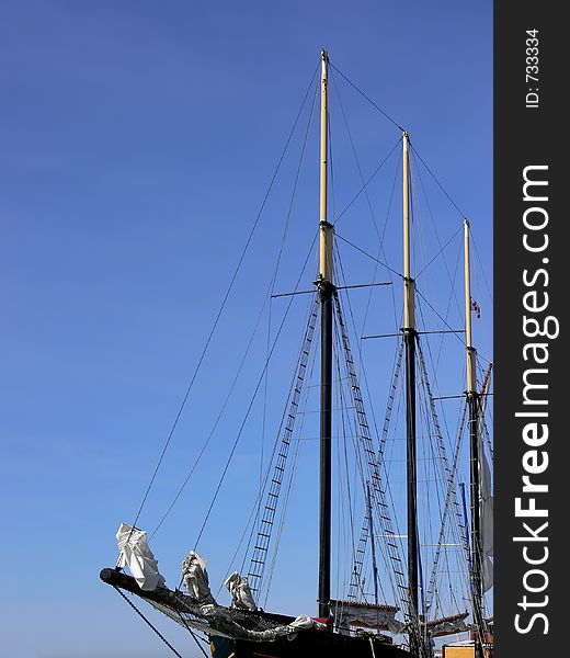 Masts, sails and rigging on a tall ship.