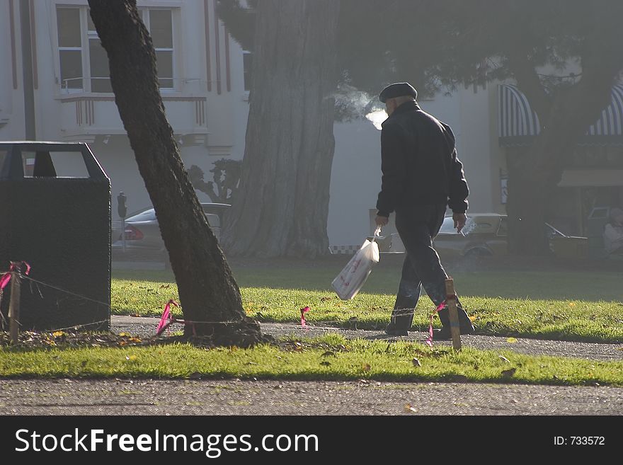 A morning walker gets his daily dose of exercise and carcinogens. A morning walker gets his daily dose of exercise and carcinogens.