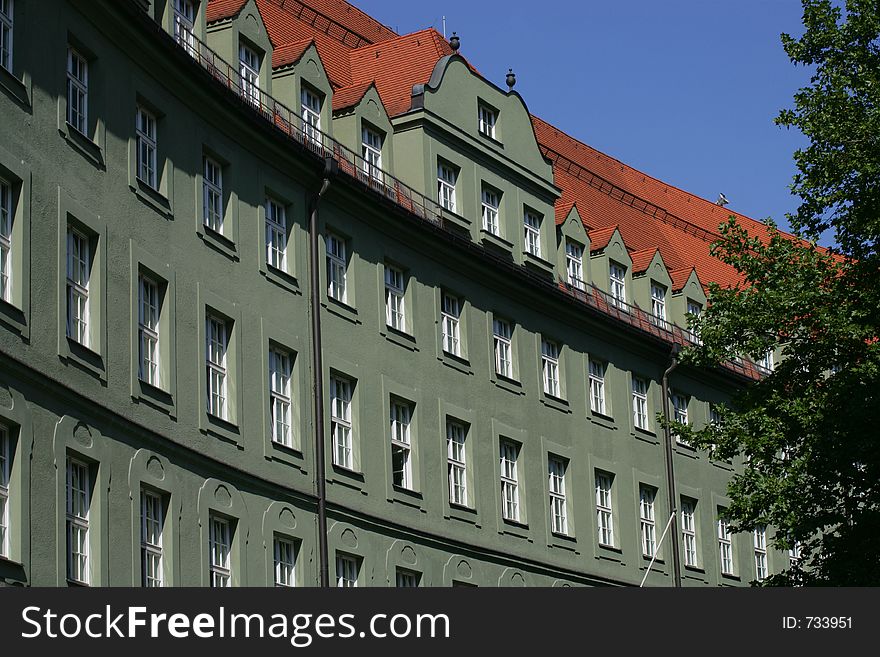 Curved building with rows of windows in Munich, Germany. Curved building with rows of windows in Munich, Germany.