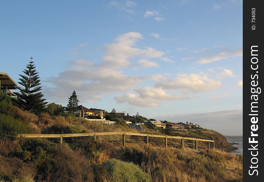 Picturesque seaside landscape - houses on a hill. Picturesque seaside landscape - houses on a hill