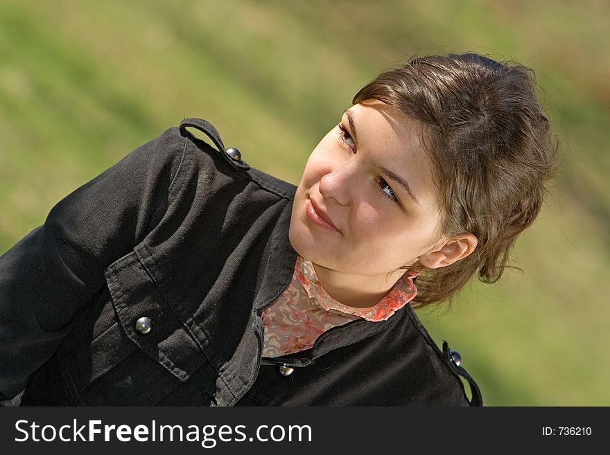 Young woman looking to her right. Young woman looking to her right