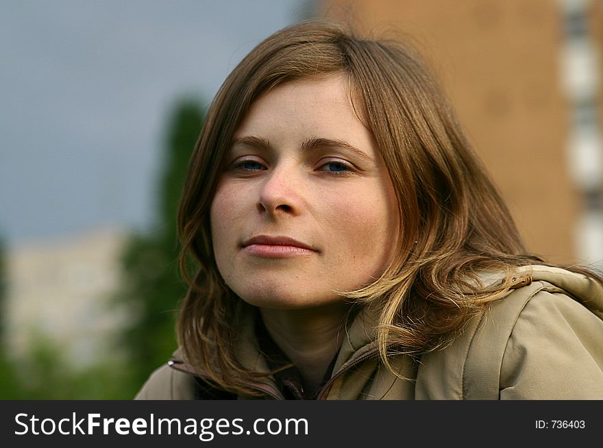 Portrait of a blonde girl with mysterious look