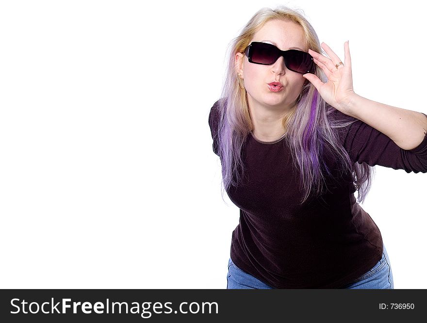 Laughing pretty girl with long violet hair and dark sunglasses sending a kiss with copyspace. Laughing pretty girl with long violet hair and dark sunglasses sending a kiss with copyspace