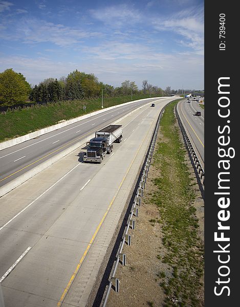 Semi Dump Truck on the highway with Copy Space (Wide Angle)