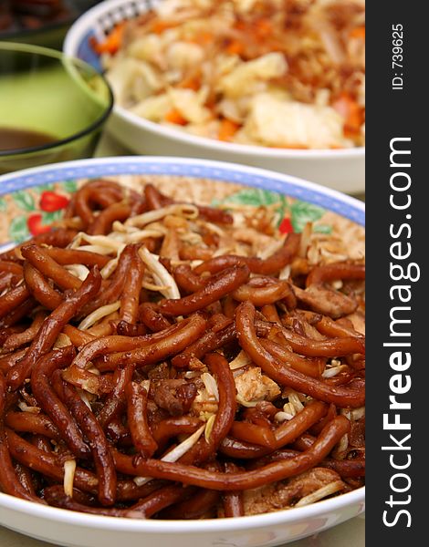 Chinese stir-fried Udon black noodles. Chinese stir-fried Udon black noodles