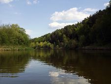 Calm Bend Of River With Forest Stock Image
