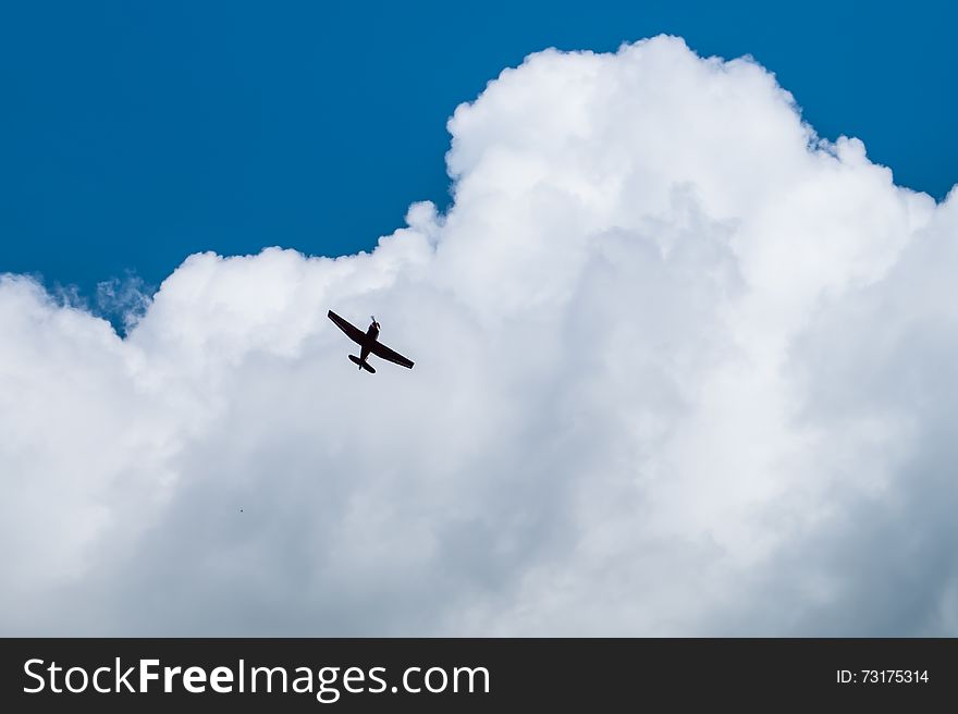 Flying high airplane in clouds. Flying high airplane in clouds