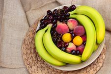Wooden Bowl Of Fruits Stock Images