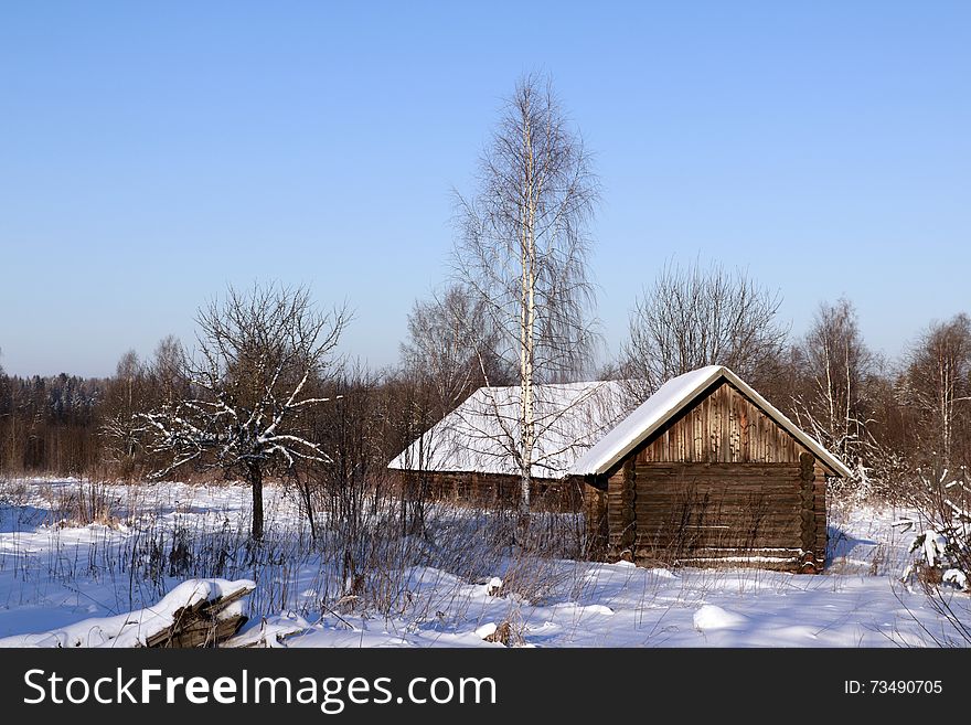 House in a village in a winter day